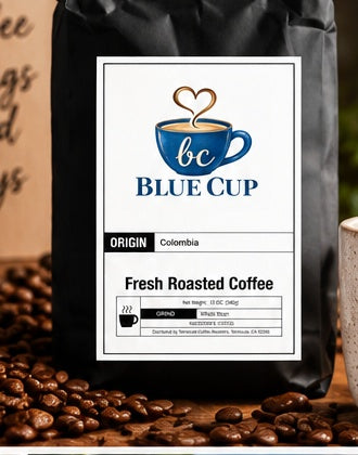 Blue Cup Colombia coffee bag with roasted coffee beans in a warm lifestyle setting