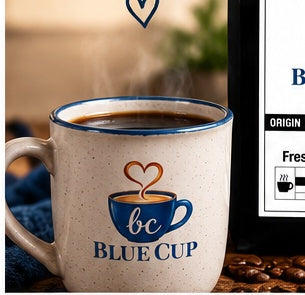 Blue Cup branded coffee mug beside the Discovery Sample Pack