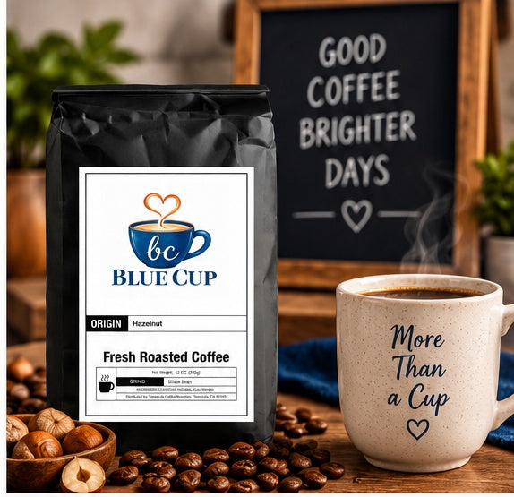 Blue Cup Hazelnut Coffee bag with coffee, roasted beans and hazelnuts in a warm lifestyle setting