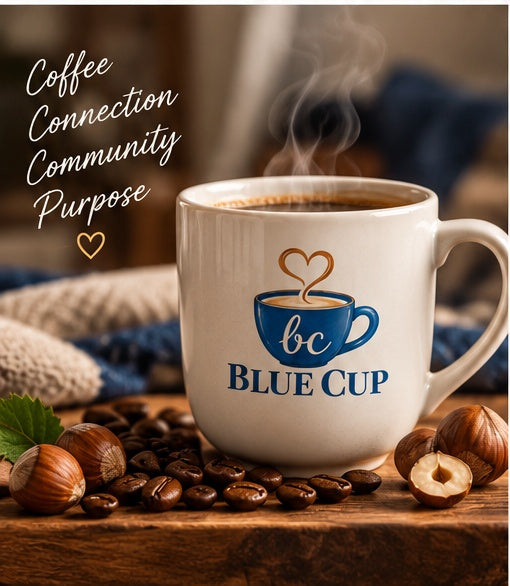 Steaming Blue Cup Hazelnut Coffee with roasted beans and hazelnuts